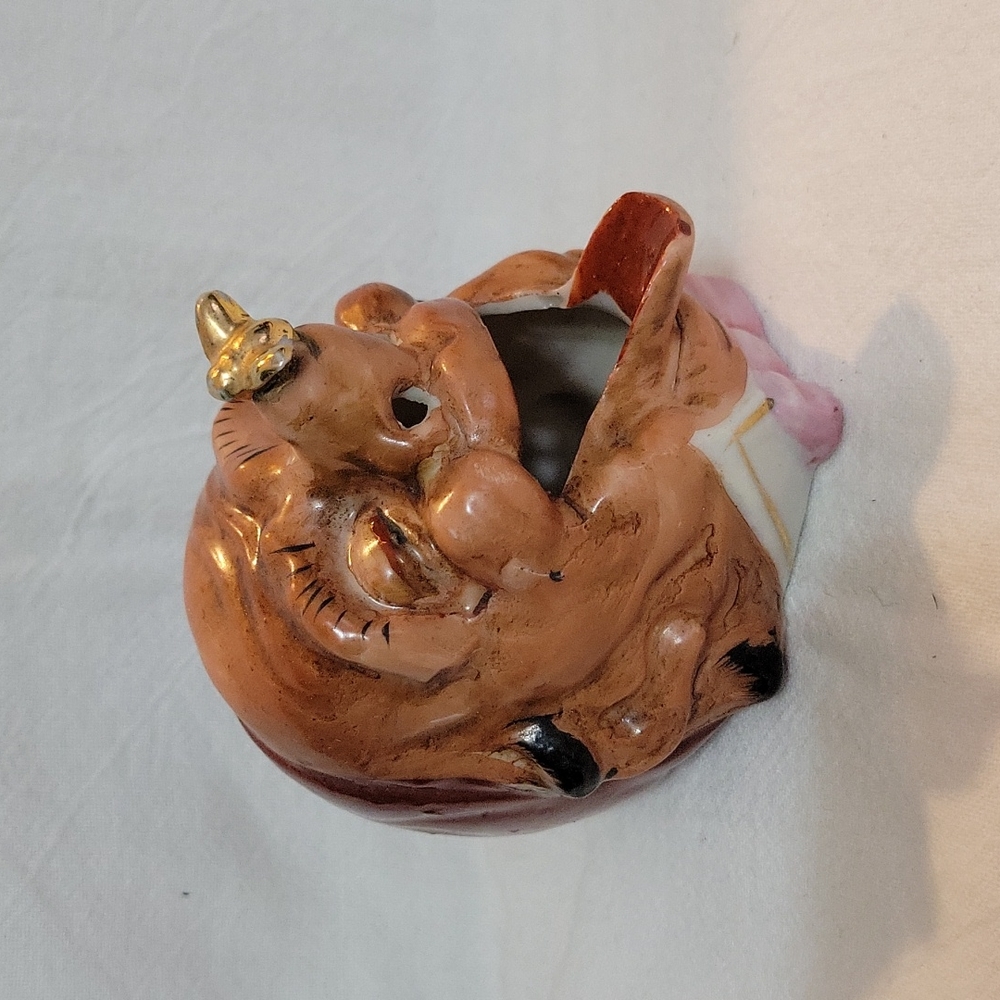 Vintage Ashtray. Man with bee on nose.